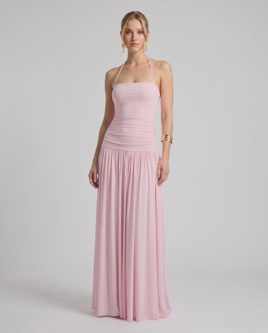 Elara Maxi Dress in pink, featuring a halter neck, smooth stretch jersey, and a flowing maxi skirt for a chic look by Lauven.