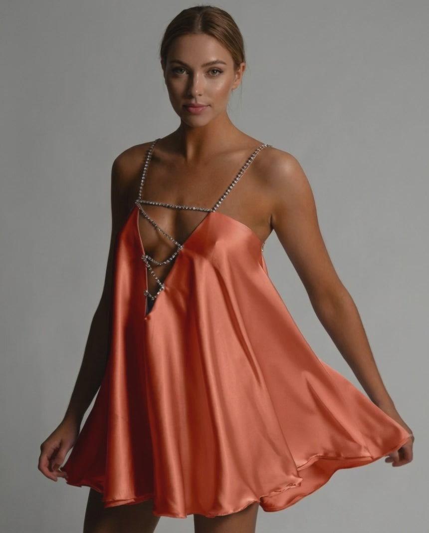 Marigold Mini Dress by Lauven featuring satin flared silhouette and elegant beaded spaghetti straps in burnt orange.