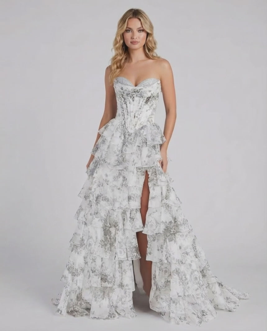 Lunaria Maxi Dress by Lauven, a stunning silver floral tiered chiffon gown with a strapless bodice and high slit.