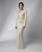 Liora Maxi Dress by Lauven, featuring a flowing silhouette, elegant bell sleeves, and luxurious satin fabric.