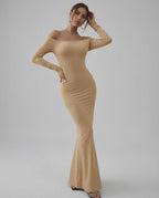 Lauven Vesper Maxi Dress in neutral beige, featuring an elegant off-shoulder silhouette and smooth stretch fabric.