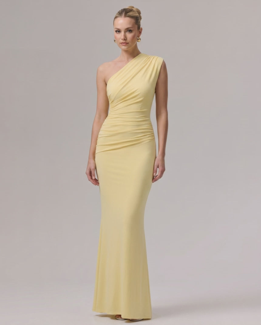 Aurelia Maxi Dress in yellow, one-shoulder design, stretch jersey, offers a sleek silhouette for elevated occasions by Lauven.