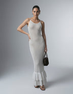 Pearl Maxi Dress by Lauven, elegant white hollow out bodycon maxi dress with ruffled hem.