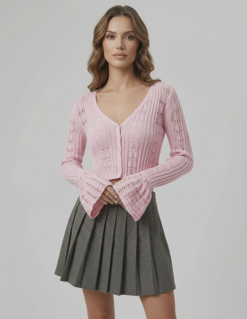 Roselle Cardigan in pink, featuring openwork knit detailing and a cropped silhouette by Lauven, perfect for feminine styling.