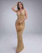 Lunara Maxi Dress in textured polyester blend, featuring halter V-neck, perfect for warm-weather styling by Lauven.