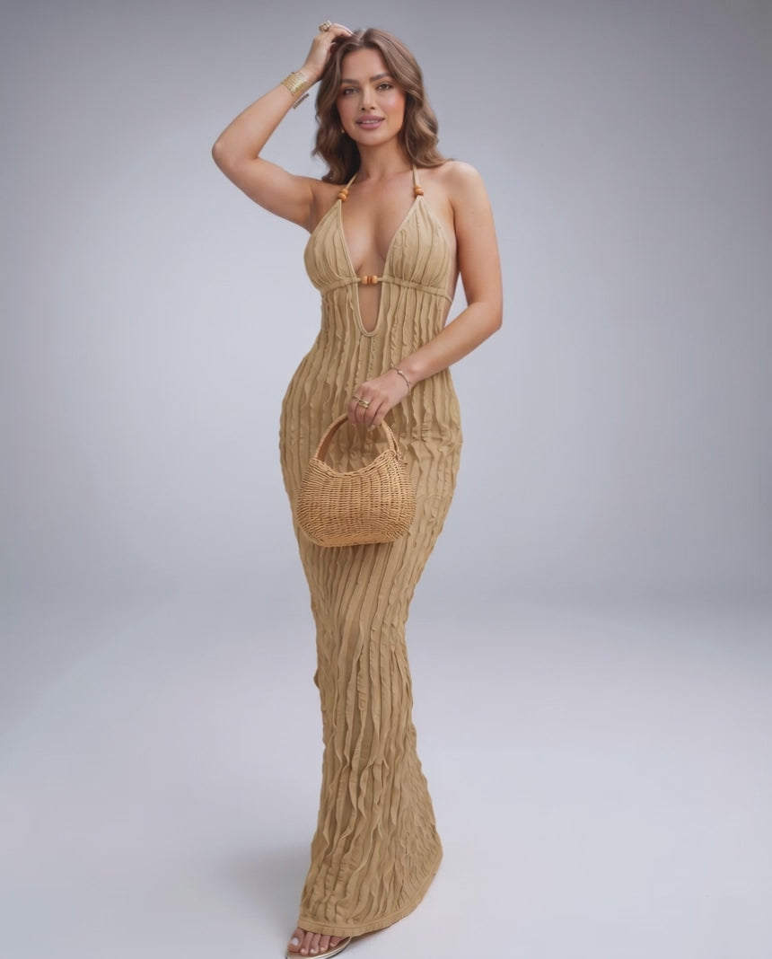 Lunara Maxi Dress in textured polyester blend, featuring halter V-neck, perfect for warm-weather styling by Lauven.