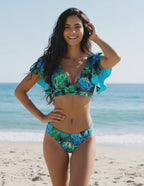 Coralia Two-Piece Swimsuit by Lauven, blue tropical print, deep V-neckline, and flutter sleeves, perfect for beach days.
