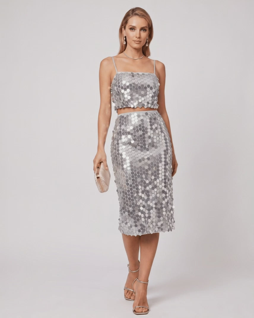 Lustra Sequin Set - A high-shine two-piece evening outfit featuring a sequined cropped top and midi skirt by Lauven.