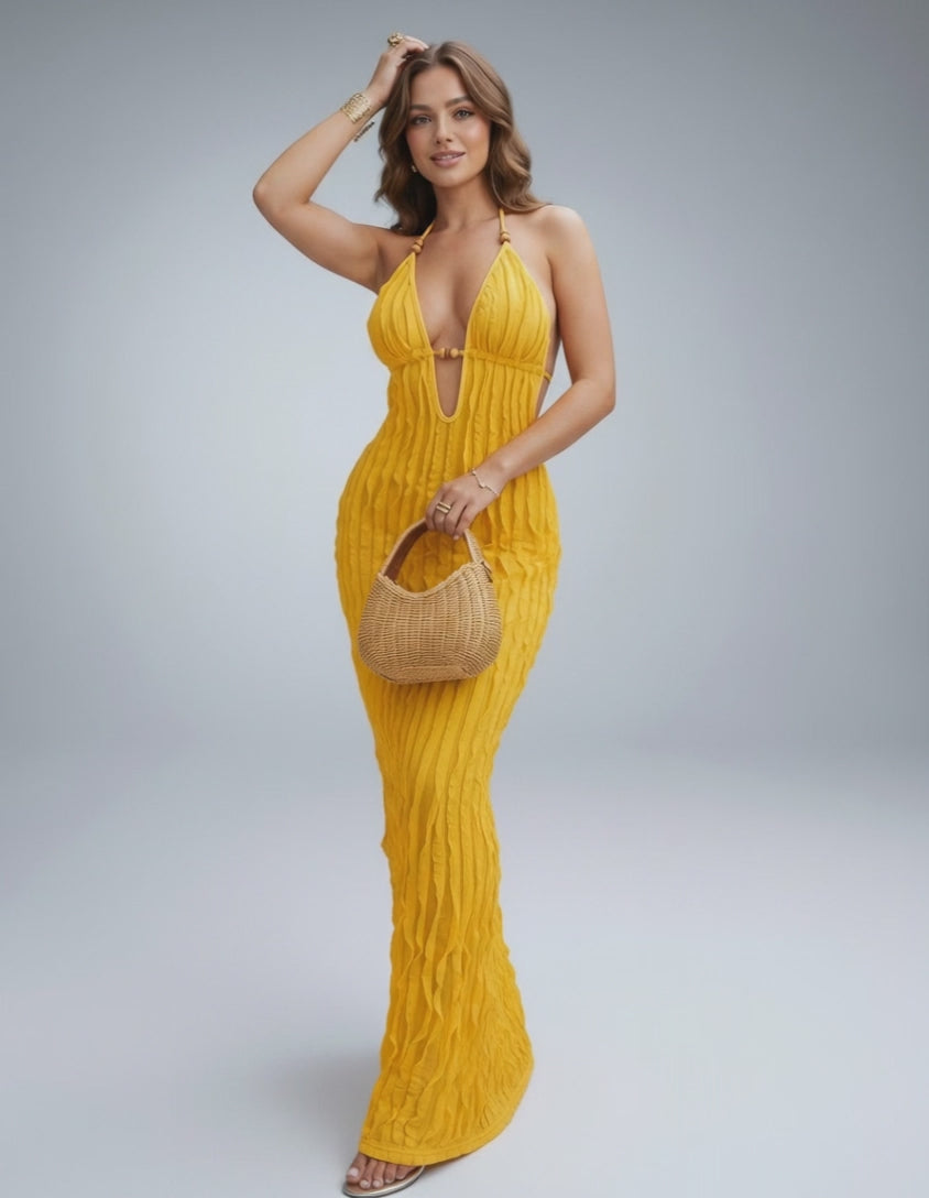 Lunara Maxi Dress in textured polyester blend, halter V-neck design for modern, warm-weather elegance by Lauven.