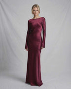 Vesper Maxi Dress in rich burgundy satin, featuring a slim fit silhouette and dramatic draped back by Lauven.