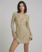 Luna Mini Dress by Lauven, elegant pleated long sleeve mini dress in light beige with deep V-neckline.
