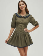 Aveline Mini Dress by Lauven featuring a Peter Pan collar and puff sleeves in olive green with navy accents.
