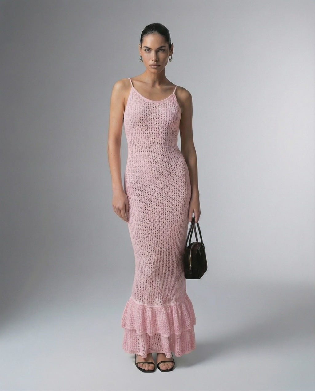 Rosaline Maxi Dress by Lauven – Pink bodycon maxi dress with hollow out knit texture and ruffled hem.