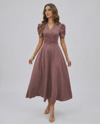 Sienna Midi Dress in mauve, featuring puffed sleeves, V-neckline, and ruched waist, perfect for elegant occasions by Lauven.