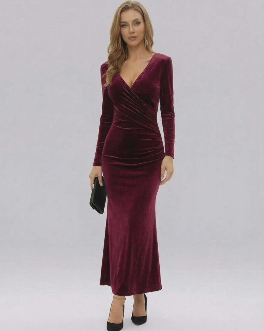 Celeste Maxi Dress by Lauven, showcasing a luxurious burgundy velvet design with long sleeves and a slim-fit silhouette.