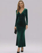 Sylvia Maxi Dress by Lauven in elegant emerald velvet, featuring a V-neckline and full-length sleeves.
