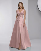 Roselle Maxi Dress in pink satin with A-line silhouette, V-neck, and elegant bow detail by Lauven.