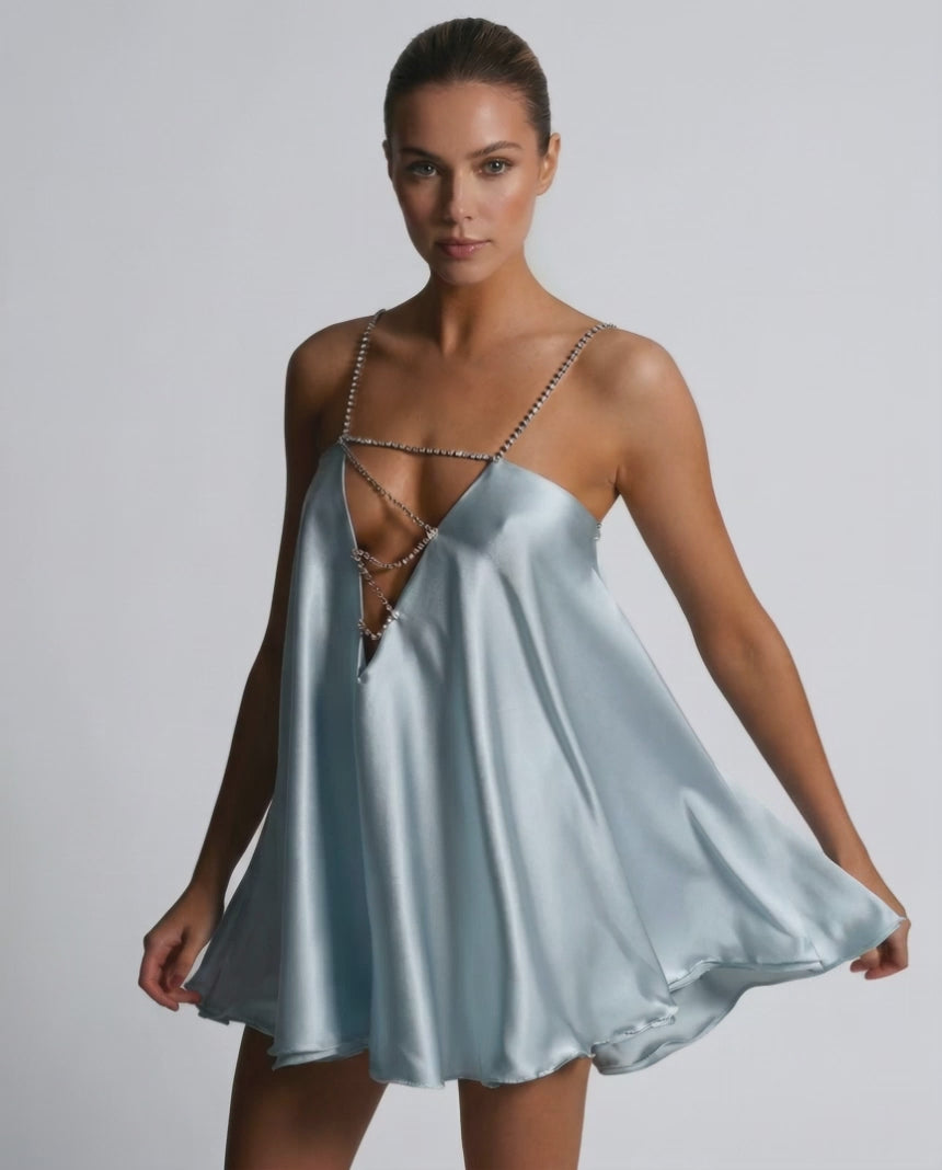 Celeste Mini Dress by Lauven in soft sky blue satin with rhinestone detailing, featuring an airy A-line cut.