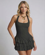Obsidian Mini Dress by Lauven, sleeveless design with tiered ruffle skirt in classic black, flattering silhouette.