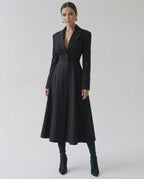 Valen Midi Dress: Elegant black A-line blazer dress with long sleeves by Lauven, enhancing feminine sophistication.
