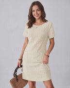 Avelin Mini Dress by Lauven, featuring textured fabric, round neckline, and a stylish mini length for warm weather.