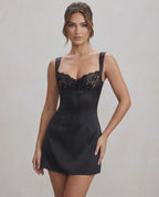 Noir Mini Dress by Lauven, black satin with lace detail, sleek V-neck, slim fit, perfect for modern elegance.