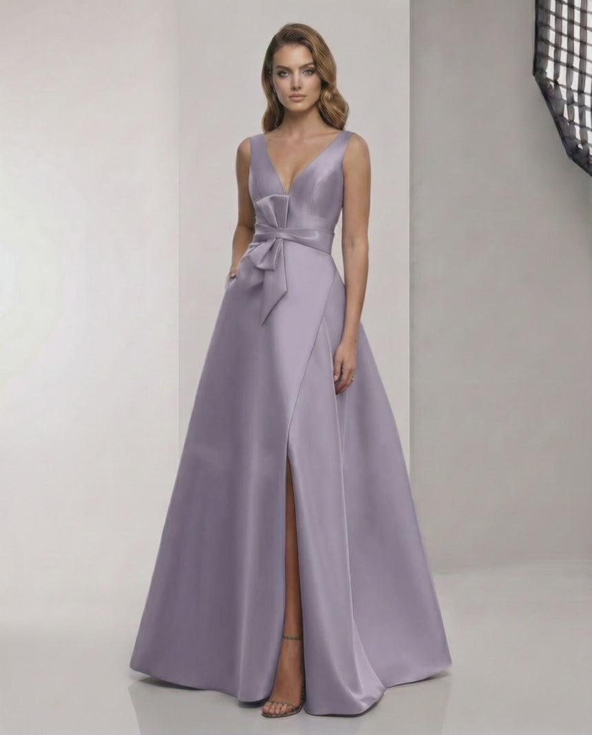 Lirienne Maxi Dress: Satin lavender A-line gown with V-neck, bow detail, and elegant silhouette by Lauven.