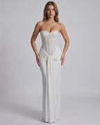 Serelisse Maxi Dress showcasing an off-the-shoulder design, structured corset bodice, and fluid skirt by Lauven.