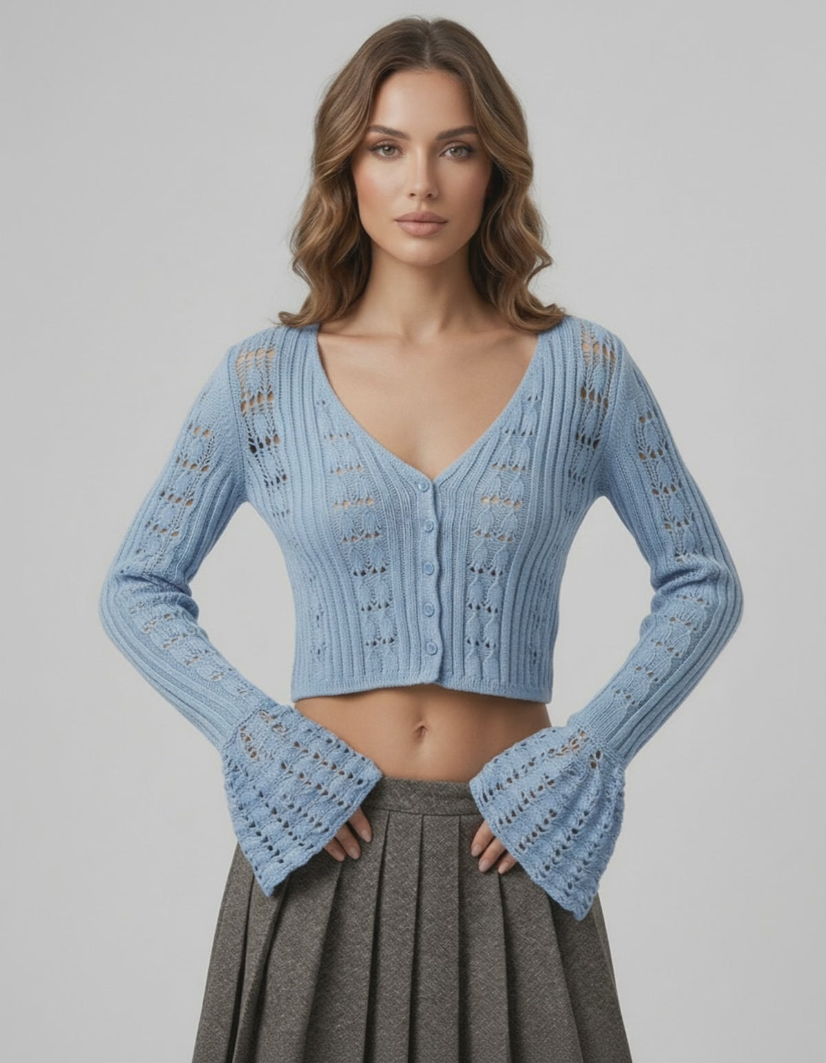 Oberon Cardigan Blue Cropped Sweater with openwork knit texture by Lauven, perfect for versatile seasonal styling.