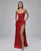 Liora Maxi Dress in luxury red satin features strapless design and thigh-high slit, embodying modern glamour by Lauven.