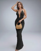 Lunara Maxi Dress in textured polyester blend, halter v-neck, showcasing a modern silhouette by Lauven.