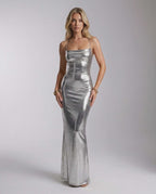Celestia Maxi Dress in silver metallic, features a sleek fit and open back, by Lauven, perfect for a glamorous evening.