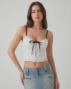 Arden Top by Lauven - White camisole with black bow detail for stylish everyday wear.
