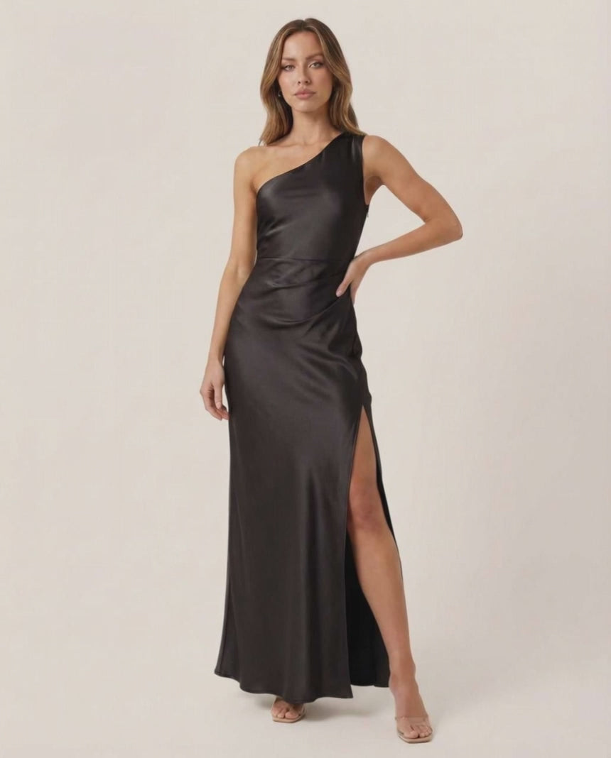Noire Maxi Dress featuring a sleek one-shoulder silhouette in black satin by Lauven, perfect for elegant occasions.