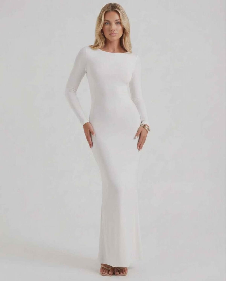 Lauven Celeste Maxi Dress in elegant white with long sleeves and open back, perfect for formal occasions.