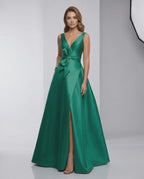 Siena Maxi Dress styled in green satin, featuring A-line silhouette, V-neckline, and elegant bow detail by Lauven.