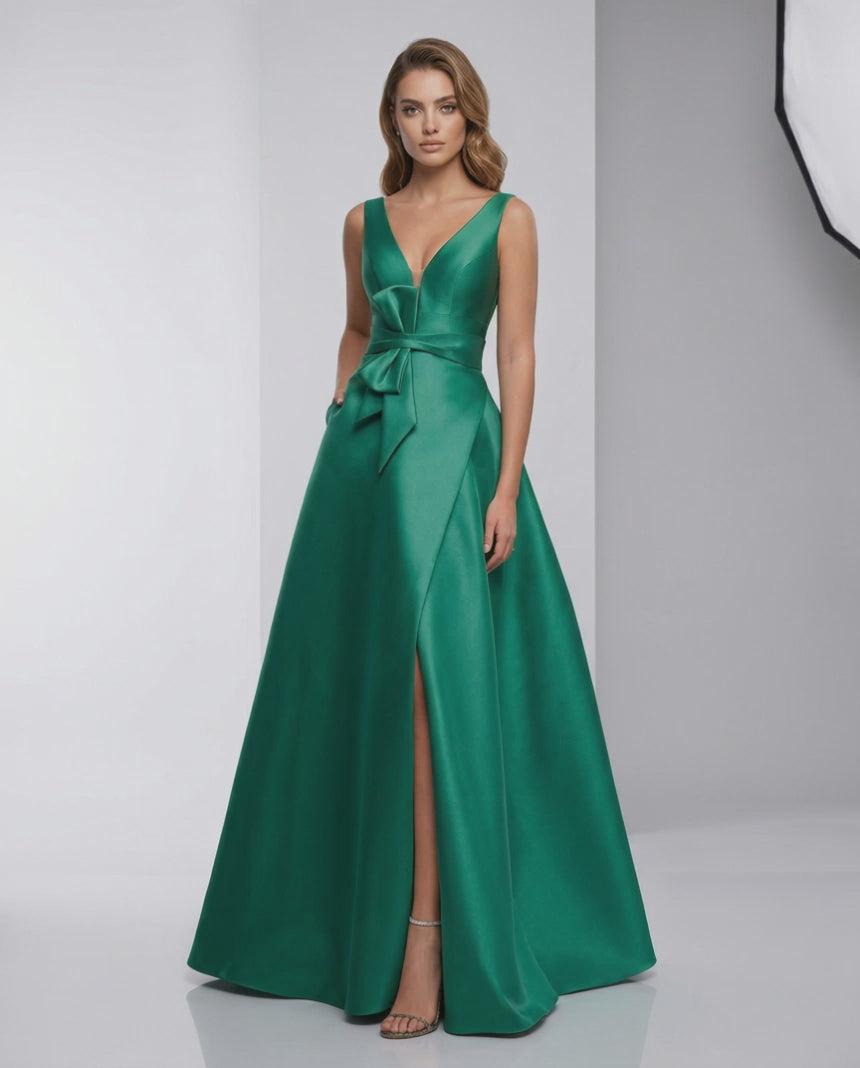 Siena Maxi Dress styled in green satin, featuring A-line silhouette, V-neckline, and elegant bow detail by Lauven.