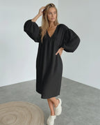 Noir Midi Dress by Lauven, black cotton dress with puff sleeves, v neck, elegant and comfortable for modern style.