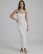 Luna Maxi Dress by Lauven featuring a sleek sheath silhouette in crisp white with spaghetti straps.
