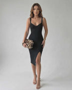 Nova Midi Dress – classic black sheath dress with side slit, from Lauven, blending elegance and comfort.