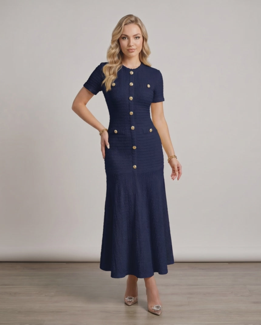 Aureline Maxi Dress featuring textured knit, round neck, and flared hem by Lauven, exuding elegance and fluidity.