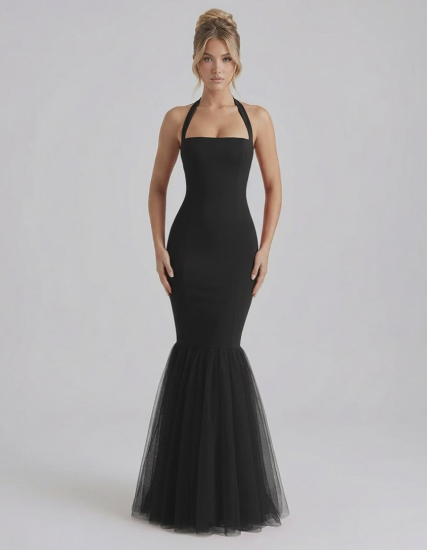 Monaco Maxi Dress: Black halter neck bodycon dress with tulle hem, offering a sleek fit by Lauven.