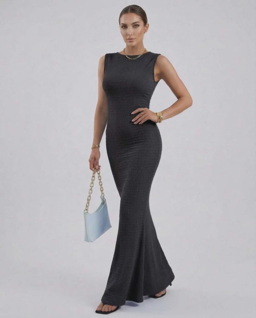 Nova Maxi Dress by Lauven, a black sleeveless slim fit ankle-length pencil dress with textured fabric.