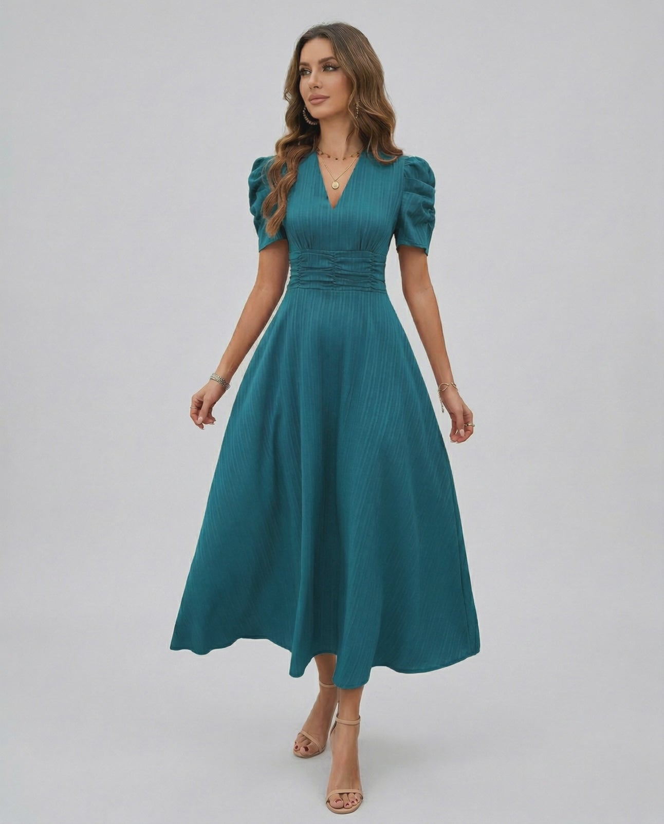 Zahara Midi Dress Teal midi dress with puff sleeves, flattering V-neck, and cinched waist by Lauven, perfect for weddings.