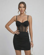 Verena Mini Dress by Lauven, featuring a sleek cut-out, slim fit, and modern design in a stylish black color.