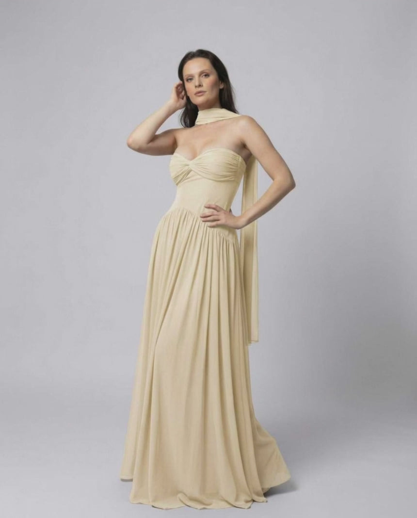 Elara Maxi Dress – Elegant beige strapless dress with choker scarf by Lauven, featuring a flowing skirt and fitted bodice.