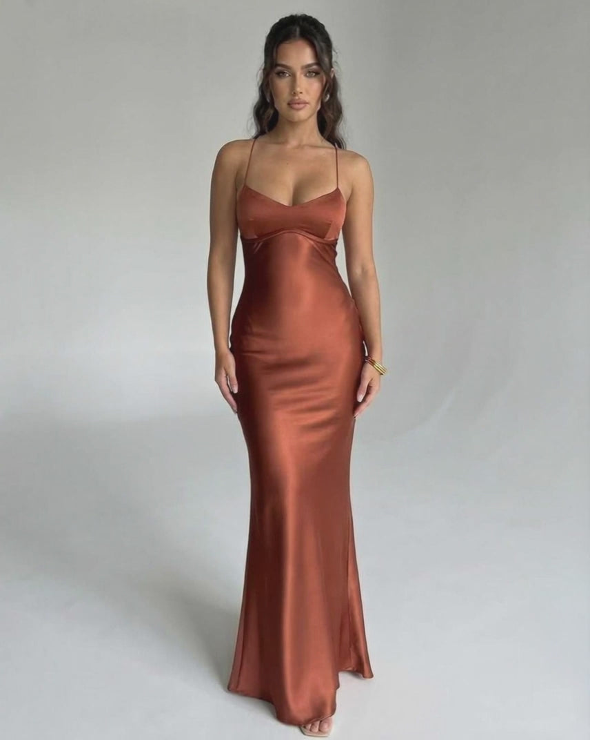 Celeste Maxi Dress featuring elegant satin V-neck, slim fit silhouette, and rich copper tone by Lauven.