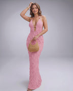 Lunara Maxi Dress in pink, textured polyester blend with halter V-neck, perfect for warm-weather occasions by Lauven.