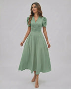 Verdant Midi Dress in sage green, featuring a V-neckline, puff sleeves, and ruched waist by Lauven for elegant occasions.