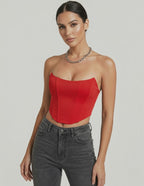 Solara Corset Top in vibrant red velvet by Lauven captures a structured silhouette, exuding elegance and modern design.
